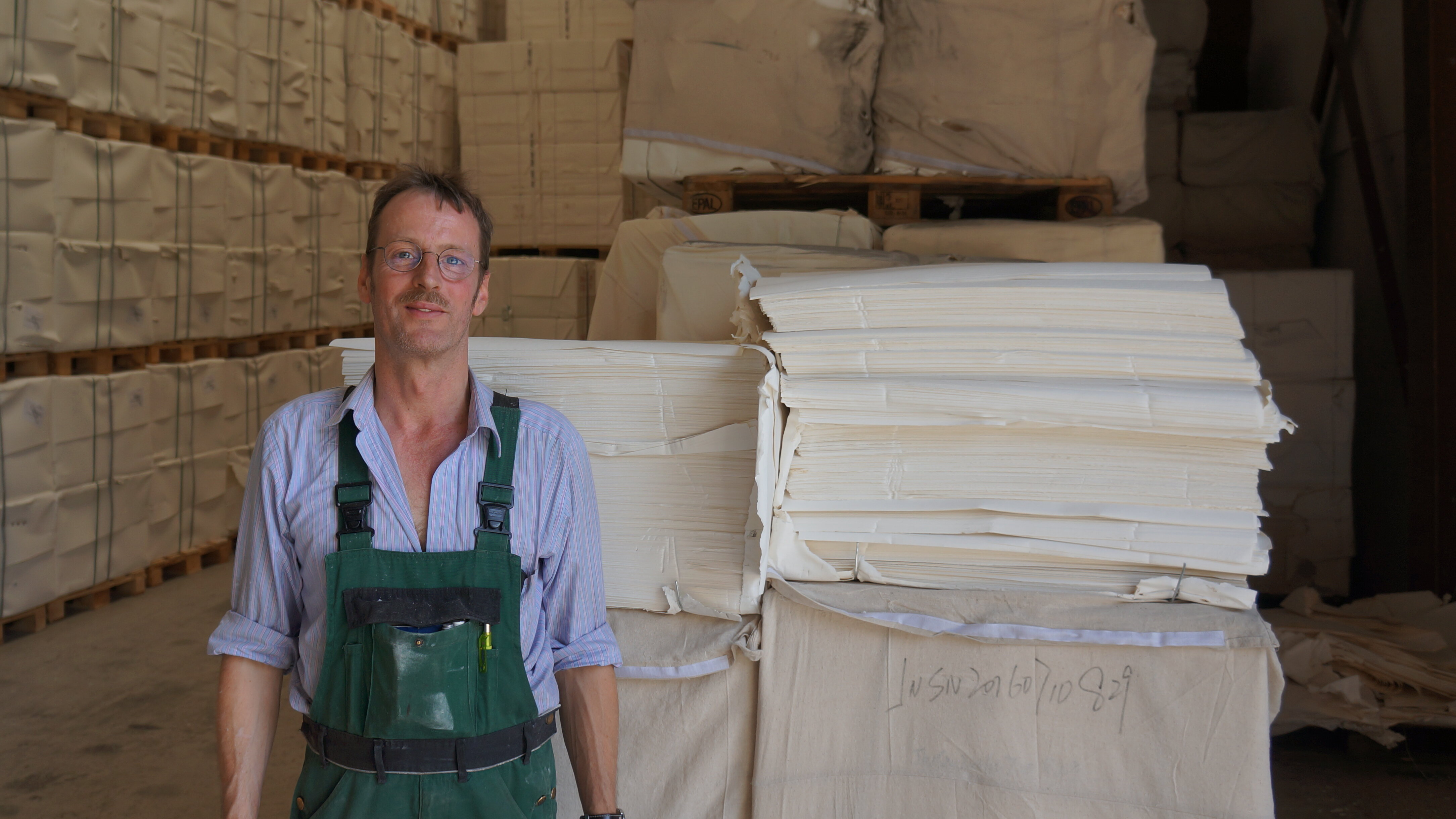 next to a pile of processed cellulose